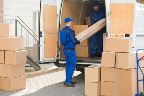 House movers handling a London home relocation with careful loading