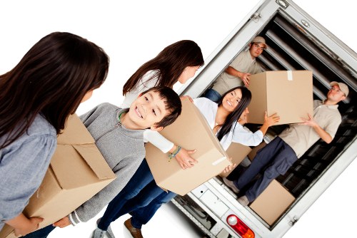 Commercial moving team handling office furniture in London