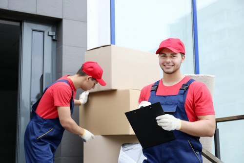 Moving team handling a London home relocation in a residential street