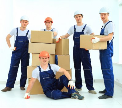 Packed boxes and furniture prepared for a residential move in London