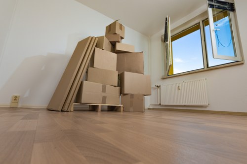 Office removal team preparing furniture and boxes for a London business move