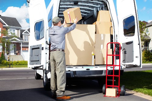 Unpacking boxes into a new London property after moving