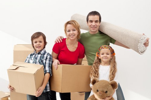 Packed belongings ready for transport in a London removals van
