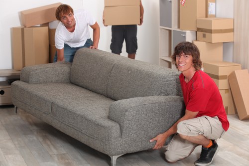 Careful loading of household items for a move within London
