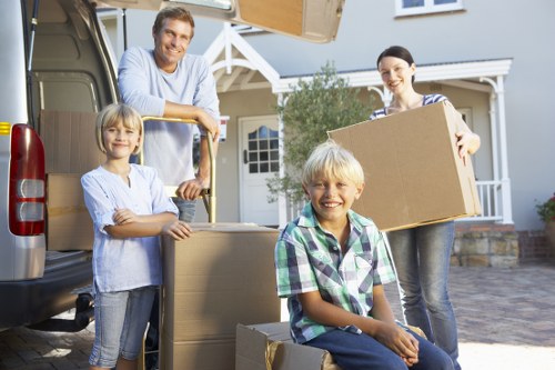 Team loading household items into a moving truck for a London removal