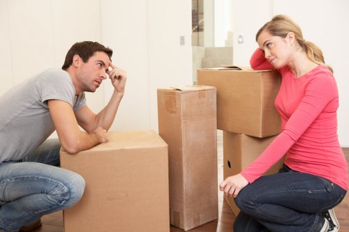 Man with van loading household items for a local London move