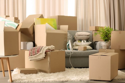 Professional removals team working safely during loading