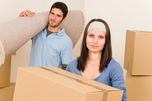Commercial movers transporting office equipment in London